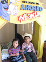 (Photo from FENACOAC) Children’s accounts are sometimes the “hook” to get remittance receivers to join the credit union.