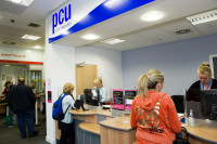 Pollok Credit Union in Glasgow, Scotland, is partnered with a local post office, offering the convenience of combined services. The manager of the credit union is the local postmaster, and the employees of both organizations are being cross-trained to better serve members and customers.