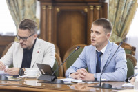 (From left) Mykhailo Fedorenko and Serhii Savchuk of the National Bank of Ukraine